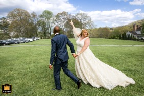 Couple leaving their wedding ceremony at Aska Farms in Blue Ridge, Georgia.